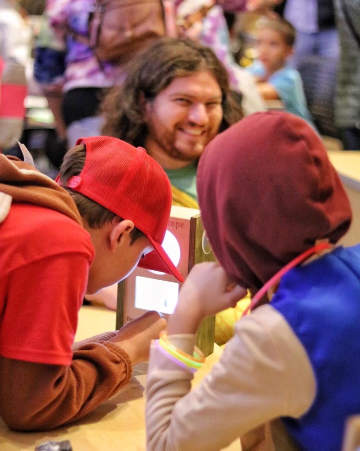 Halloween event photo 1 - smiling guy in the background